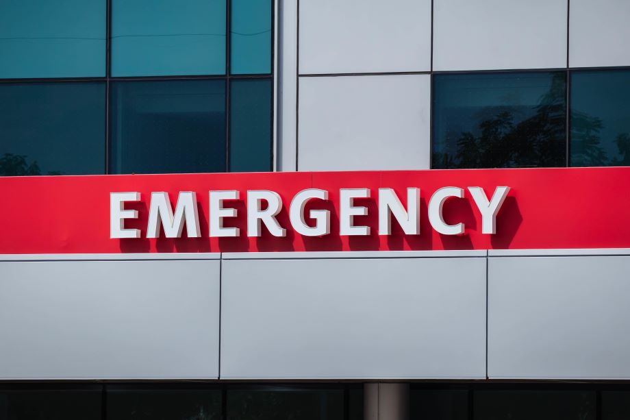 Emergency sign on exterior of building