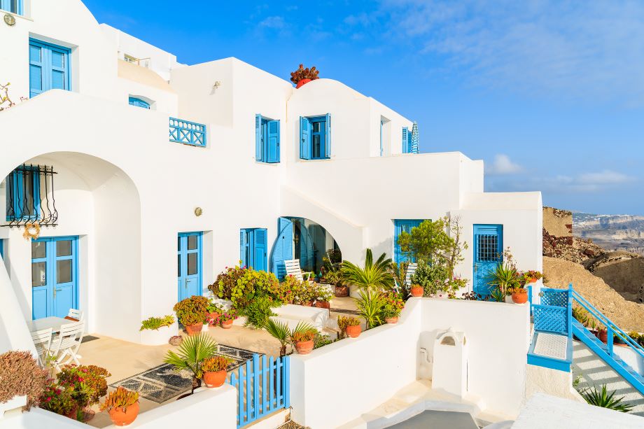 Imerovigli village blue and white apartments in Santorini
