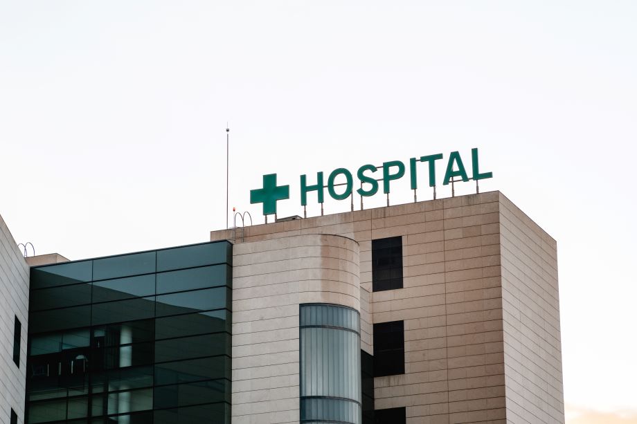 a building with a green cross on top