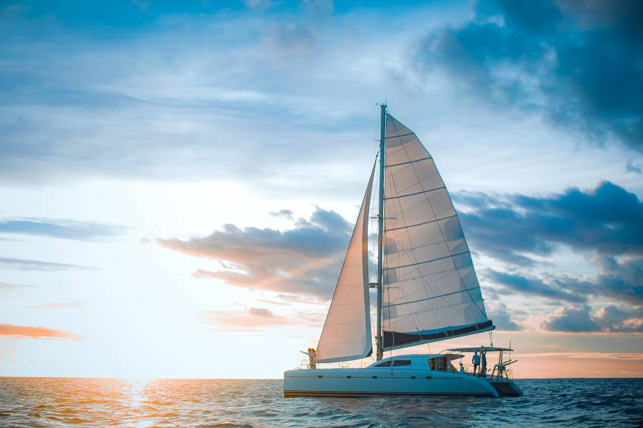 Santorini Catamaran on sea during cloudy day