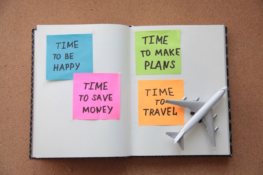 travel planning notebook with plane emblem
