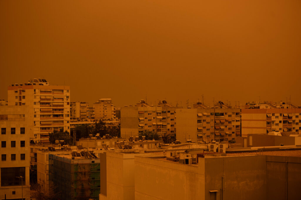 The city of Athens covered with dust from the Saharan desert