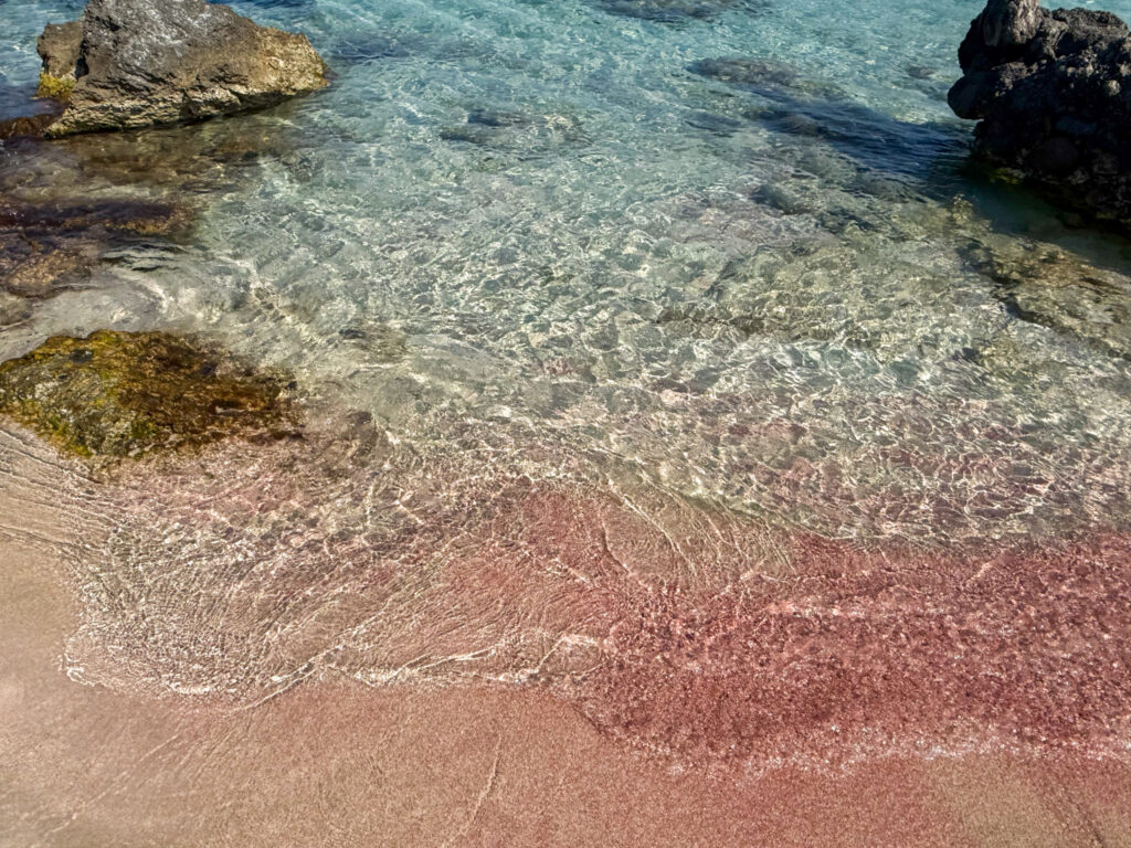 Pink sand at Falassarna Beach in Chania Crete