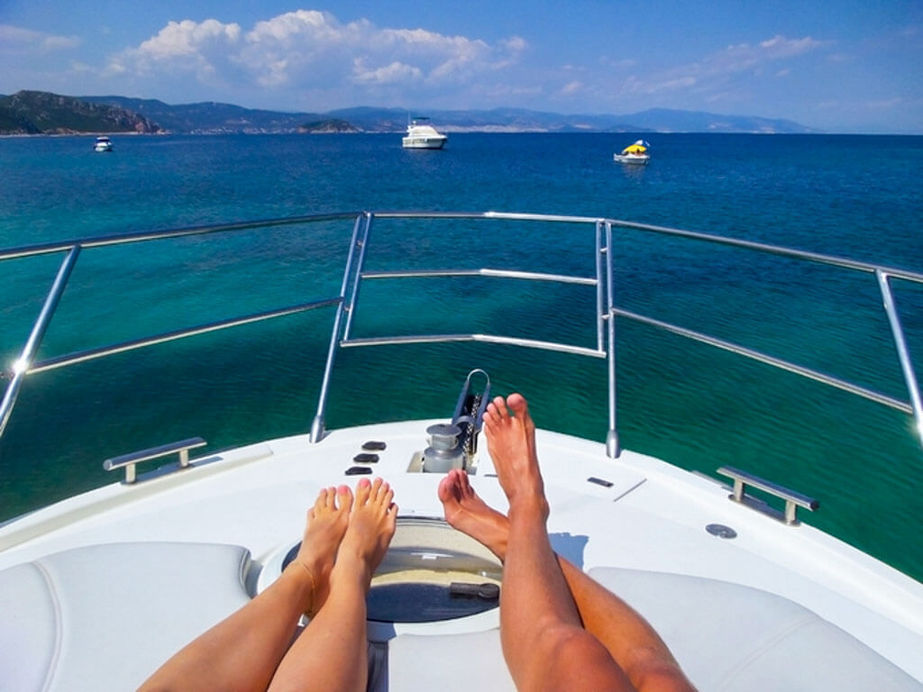 Relaxing feet on boat deck